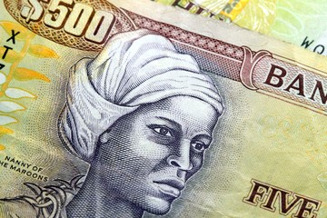 Assorted Jamaican money banknotes - Financial security concept background