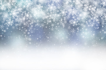 Fantasy light blue colored abstract snowfall Christmas and New Year illustration background. Beautiful silver blue colored greeting card with copy space background.