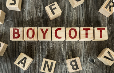 Wooden Blocks with the text: Boycott