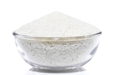 Rice in glass bowl/Rice in glass bowl close up isolated on white background.