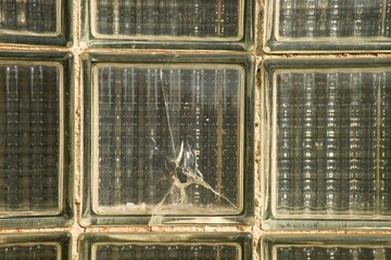 Broken old glass brick wall. Postmodern socialist style