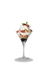 Sundae with cream, strawberries and cornflakes