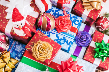 Christmas presents on white wooden background