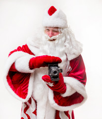 Santa Claus with old camera