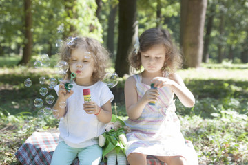 Fototapeta premium child and soap bubbles