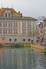 Historical buildings on the embankment of Reuss