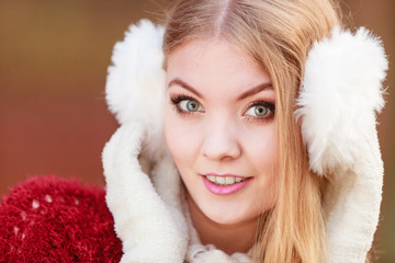 Portrait of pretty gorgeous woman in earmuffs.