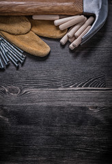 Safety gloves metal construction nails claw hammer wooden dowels