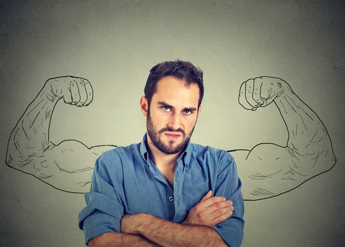 Sport Young Man With Huge, Fake, Muscle Arms Drawn On The Chalkboard