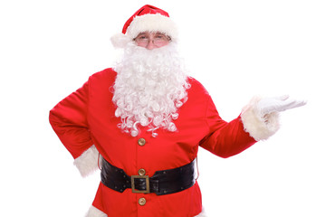 Fototapeta na wymiar Kind Santa Claus pointing in white blank sign, isolated on white background