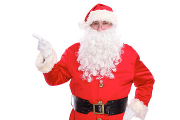 Kind Santa Claus pointing in white blank sign, isolated on white background