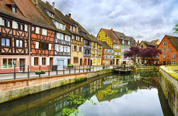 Fototapeta na wymiar Colmar, Petit Venice, water canal and traditional houses. Alsace