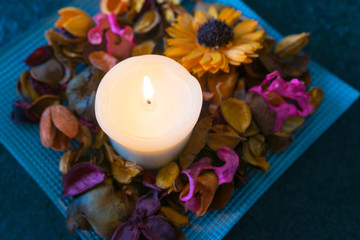 Candle with leaf and flower