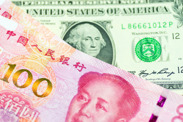 Image of foreign exchange between the US and China, with US dollar and Chinese Renminbi
