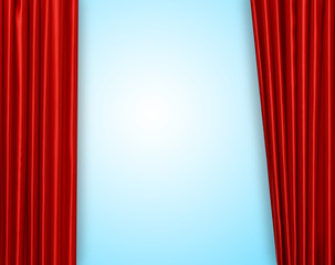 Red curtain on theater or cinema stage slightly open