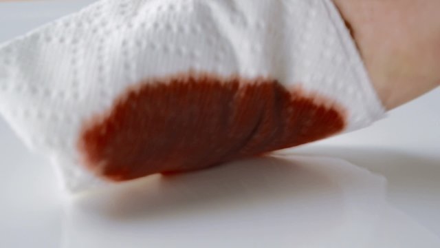 Wiping ink with paper towel shooting with high speed camera.