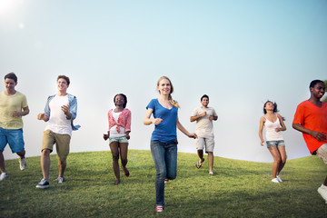 Group Casual People Running Outdoors Concept