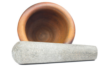 Mortar and pestle made of clay isolate on white
