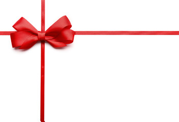 Shiny red ribbon with bow isolated on white