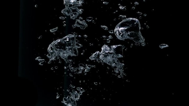 Bubbles rising in water shooting with high speed camera.