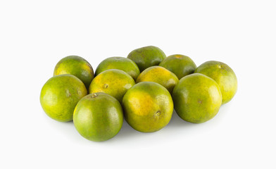 Green tangerines, isolated on white background