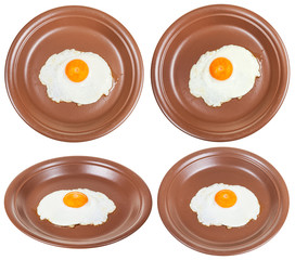 set of brown plates with one fried egg isolated