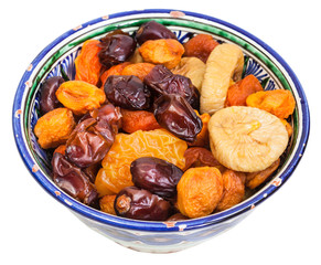 dried fruits in traditional ceramic bowl isolated