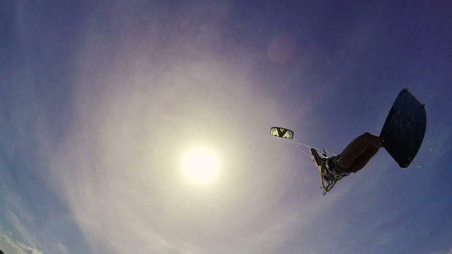 Kite Surfing Extreme Summer Sports POV GOPRO Slow Motion. Young Woman Kitesurfing in Ocean in Bikini. 