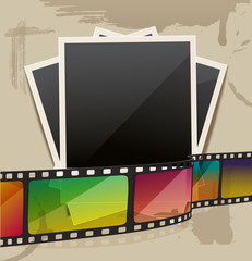 photo frame with filmstrip on stains carton background