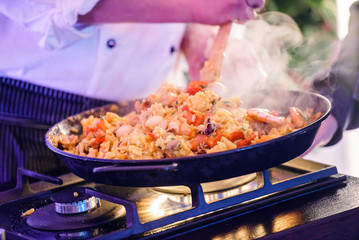 chef making paella