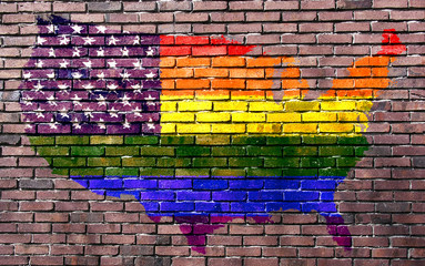 Naklejka premium Rainbow painted brick wall.
