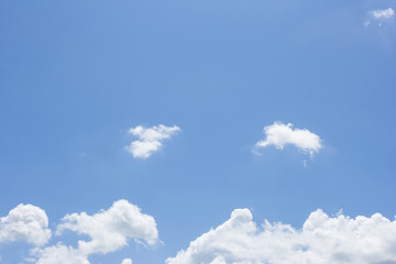 natural background - low dense white autumn clouds in blue sky