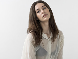 Pretty girl portrait wearing white blouse