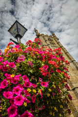 St Ia's Church clock tower and flowers