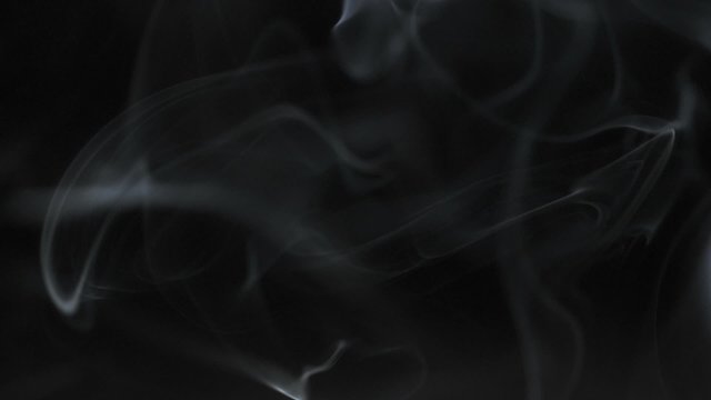 Smoke clouds on black background shooting with high speed camera, phantom flex.