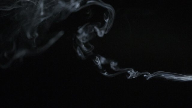 Smoke clouds on black background shooting with high speed camera, phantom flex.