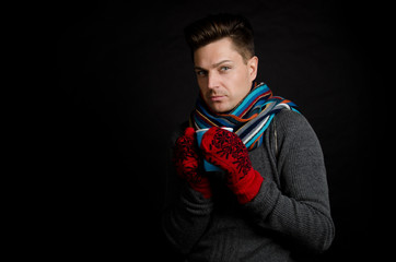 a young man in winter clothes 