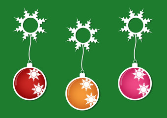Christmas multicolor balls with white snows on green background.