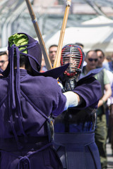 Two kendo fighters Competition with Bamboo Sword and Traditional