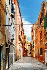 Fototapeta na wymiar Scenic medieval street at historic centre of Venice, Italy