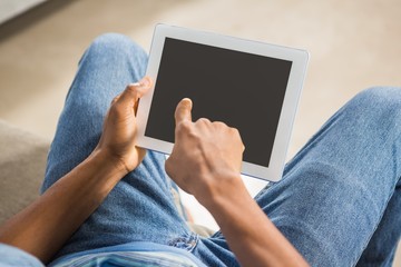 Close up view of casual man using tablet