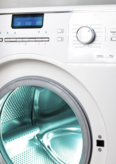 The washing machine, close up of the display, the manhole