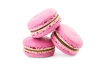 Three pink macaroon on white background