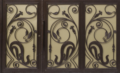 Fototapeta na wymiar Decorative Steel doors used as entrance for new houses outer yard in Kirkuk city