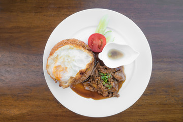 Fried Rice with Chicken Source On The Wood Table 