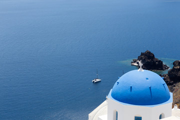 Blue domed churches on the Caldera at Oia on the Greek Island of