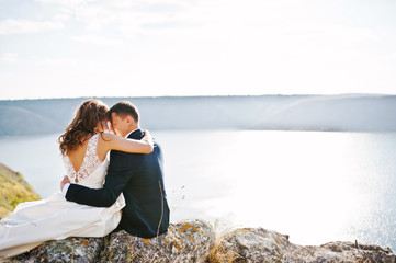 Very sensual and gorgeus wedding couple on the picturesque lands