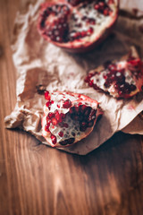 Pomegranates on a wooden background