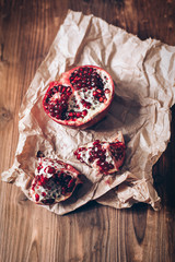 Pomegranates on a wooden background