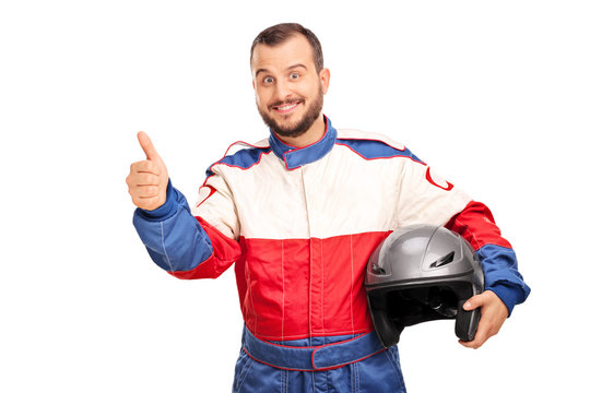 Joyful car racer giving a thumb up